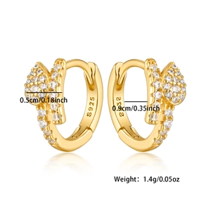 Detail view of gold snake-shaped huggie earrings with S925 mark and size measurements