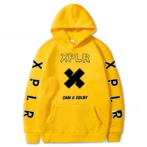 Detail shot of black XPLR and Sam & Colby graphic print on a yellow fleece hoodie