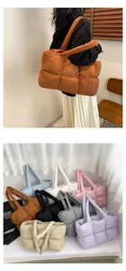 Detailed grid layout showing eight color options and on-shoulder view of quilted tote bag