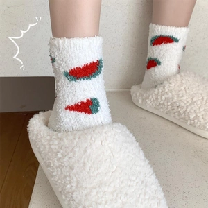 Fluffy coral fleece socks with watermelon patterns in cozy white plush slippers