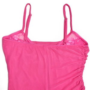 Close-up of pink lace-trimmed camisole featuring delicate adjustable straps and ruching