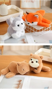 Group of cute plush animal slap bracelets including husky, fox and capybara toys