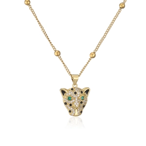 18K gold plated necklace with leopard head pendant paved in zircon and green gem eyes