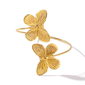 Exaggerated vintage golden butterfly open cuff bracelet with textured metallic wing details