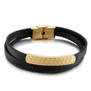 Men's braided black leather and gold stainless steel layered bracelet with fold-over clasp