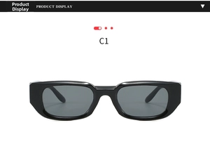 Detail view of bold black square frame sunglasses with dark grey lenses and C1 model mark