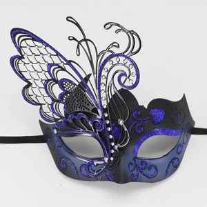 Close-up of luxury butterfly masquerade mask with blue glitter and sparkling rhinestones