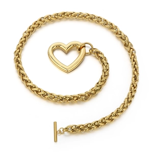 Golden heart pendant chain necklace with OT toggle clasp on a clean white background