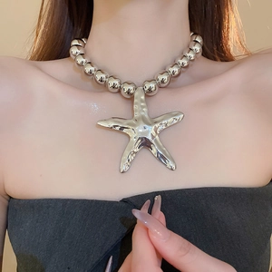 Statement silver beaded necklace with large starfish pendant in trendy Y2K style