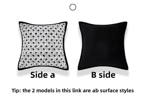 Detail of velvet braided cushion with A-side geometric weave and B-side smooth black fabric