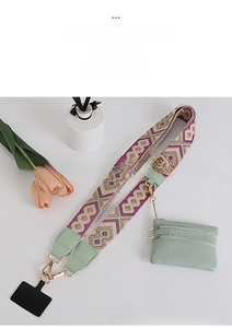 Macro view of purple geometric woven phone strap with matching mint green coin purse