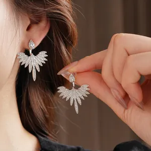 Silver needle leaf flower earrings with zircons and wing design for women