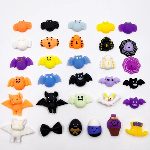 Macro shot of Halloween themed TPR squishy toys including pumpkins and ghosts