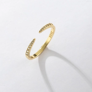 Detailed close-up of S925 sterling silver ring with small diamonds and S925 hallmark