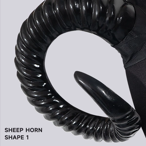 Polished black resin sheep horns with spiral texture for Halloween cosplay headband
