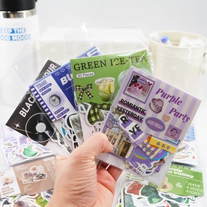 30pcs Korean retro ink animal and food stickers pack held by hand for journal deco