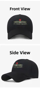 Close-up of black baseball cap featuring embroidered Air Force wings and a red star patch