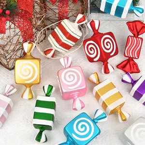Colorful striped and spiral candy-shaped Christmas tree ornaments for festive home decoration