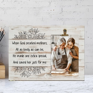 Macro detail of rustic wooden picture frame with metal clip and sentimental poem for mothers