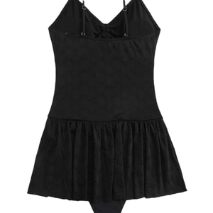 Elegant black eyelet fabric one-piece swimdress with pleated skirt and thin straps