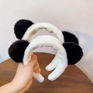 Plush panda ear headbands in black and white soft faux fur for facial washing and makeup