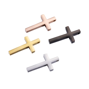 Polished stainless steel cross pendants in rose gold, gold, black, and silver finishes