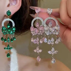Elegant silver tassel earrings with heart and drop-shaped zirconia in three colors