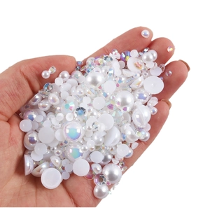 Mixed sizes of white and iridescent flatback pearls with rhinestones for DIY nail art