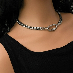 Detailed shot of polished silver Cuban chain necklace with large oval lobster clasp