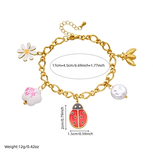Gold insect bracelet with bee, ladybug and flower charms showing precise measurements