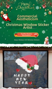Détail de stickers UV de Noël avec bonnet de Père Noël et texte de Nouvel An sur verre