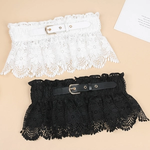 Detail of floral lace skirt extender with adjustable leather belt and metal buckle