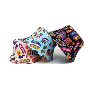 Three-piece kids graffiti bucket hats in pink, light blue, and black canvas material