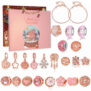 Christmas countdown calendar gift box with rose gold snake chain bracelets and pink beads