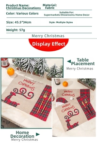 Detailed view of Merry Christmas placemat with red reindeer and plaid patterns