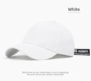 Detail of white baseball cap showing black ribbon strap with ISECURITY text print