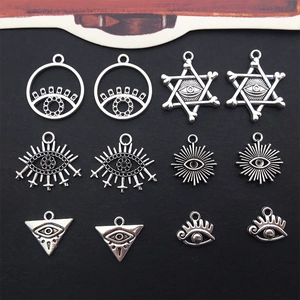 Detailed set of twelve antique silver Eye of Horus alloy pendants for DIY jewelry making