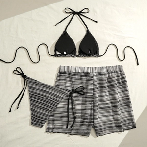 Detailed flat lay of a 3-piece striped bikini set with high waist shorts and neck ties