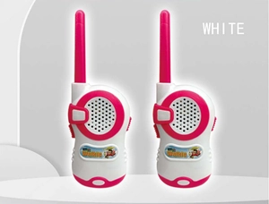 Detail of pink and white kids walkie talkie set featuring long antenna and cute walkie logo