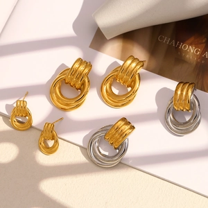 18K gold-plated stainless steel knotted hoop earrings with sleek two-tone finish