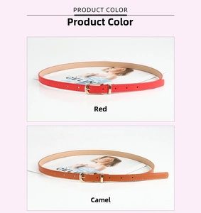 Detail view of slim PU leather belts in red and camel with gold metal pin buckles