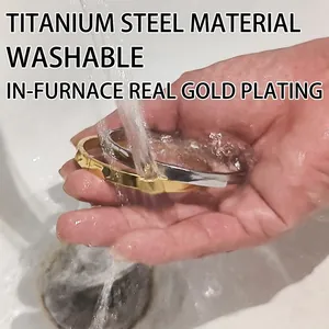 Waterproof gold and silver titanium steel bangles with star and screw motif under running water