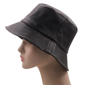 Classic black leather bucket hat for women with minimalist design and reinforced brim
