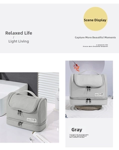 Detail view of the grey waterproof toiletry bag with double zippers and top handle