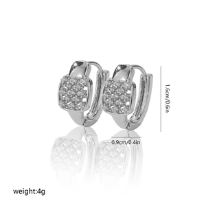 Detailed view of silver hoop earrings with cubic zirconia inlay and product measurements