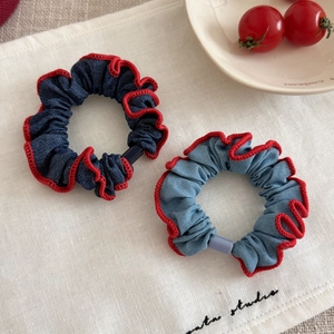 Denim scrunchie set with red ruffled edges in light and dark blue cotton fabric