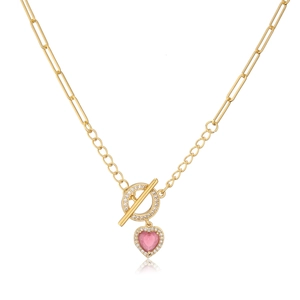 Detail of 18K gold-plated OT toggle clasp with pink heart pendant on paperclip chain