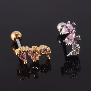 Detailed macro view of S925 sterling silver animal ear studs with pink zircon inlay