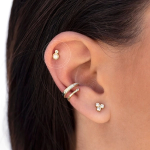 Elegant gold S925 opal and zircon stud earrings set worn on model's ear