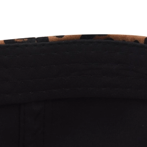 Detailed view of black sweatband and reinforced stitching inside leopard print cap